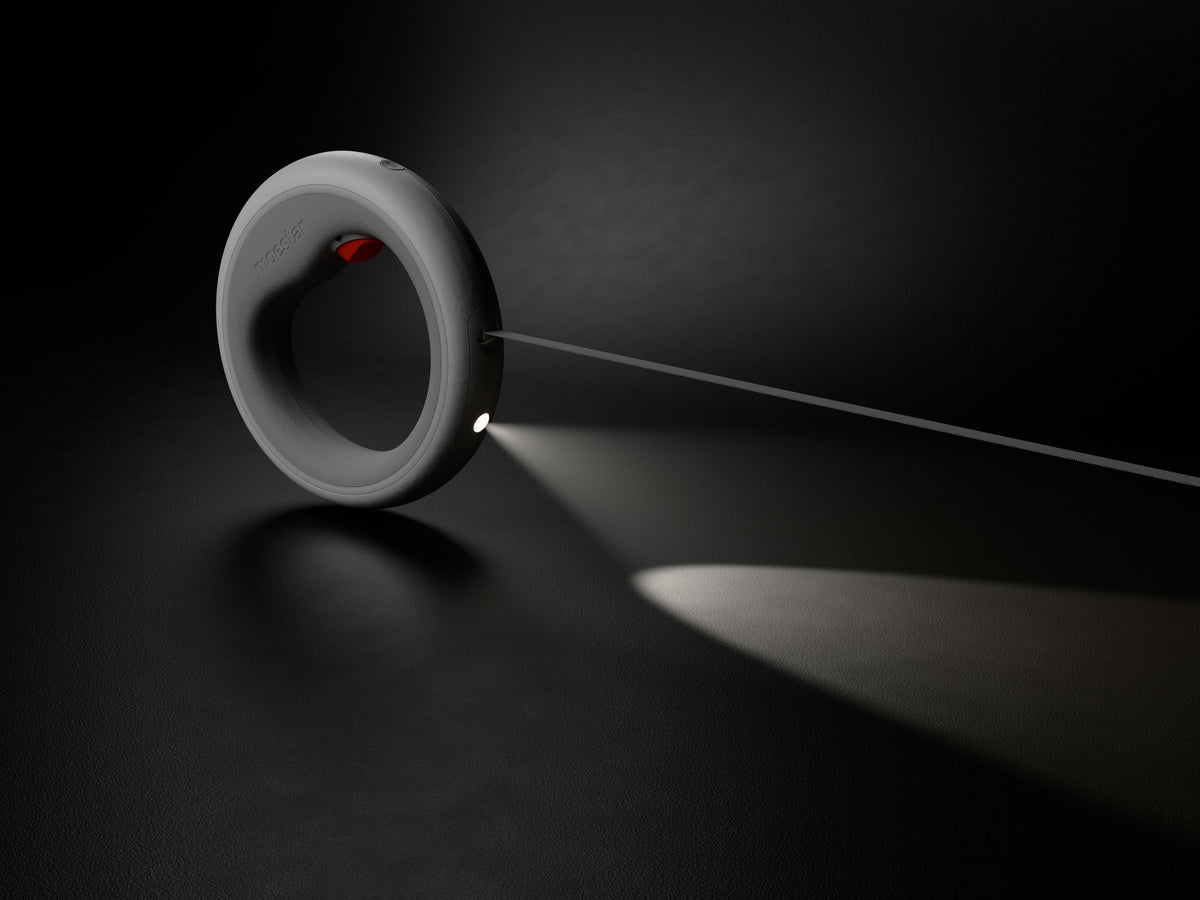UFO Leash Gen 3 torch lighting the ground at night